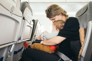 how to install rear facing car seat on airplane