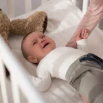 Baby Rolling in Crib Hitting Head