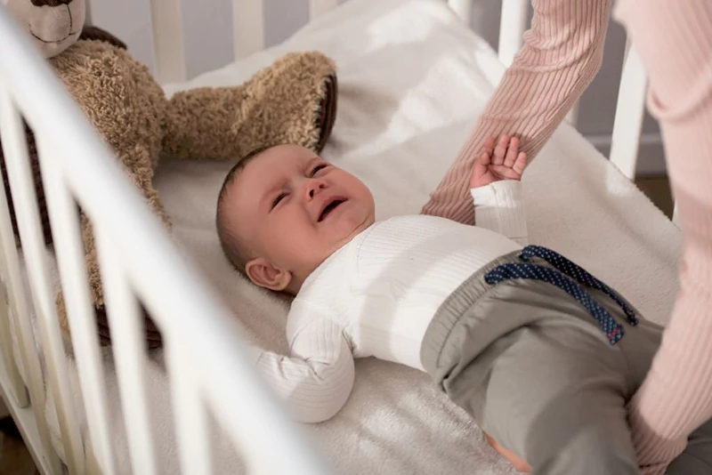 Baby Rolling in Crib Hitting Head