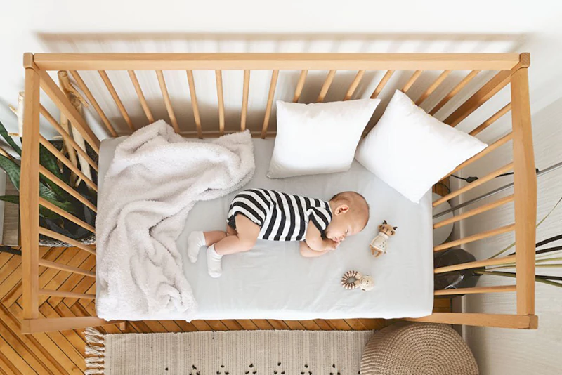 Baby hitting clearance head against crib