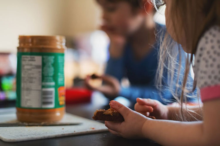 baby eating Peanut butter